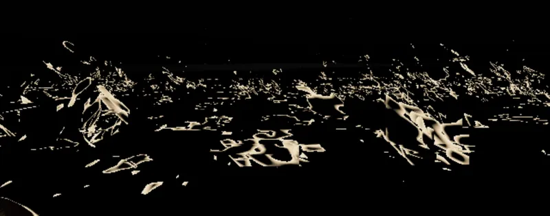 Shards of glass catching the light in the dark