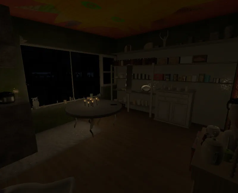 The kitchen at night: shelves of tins and jars, and candles on a round table
