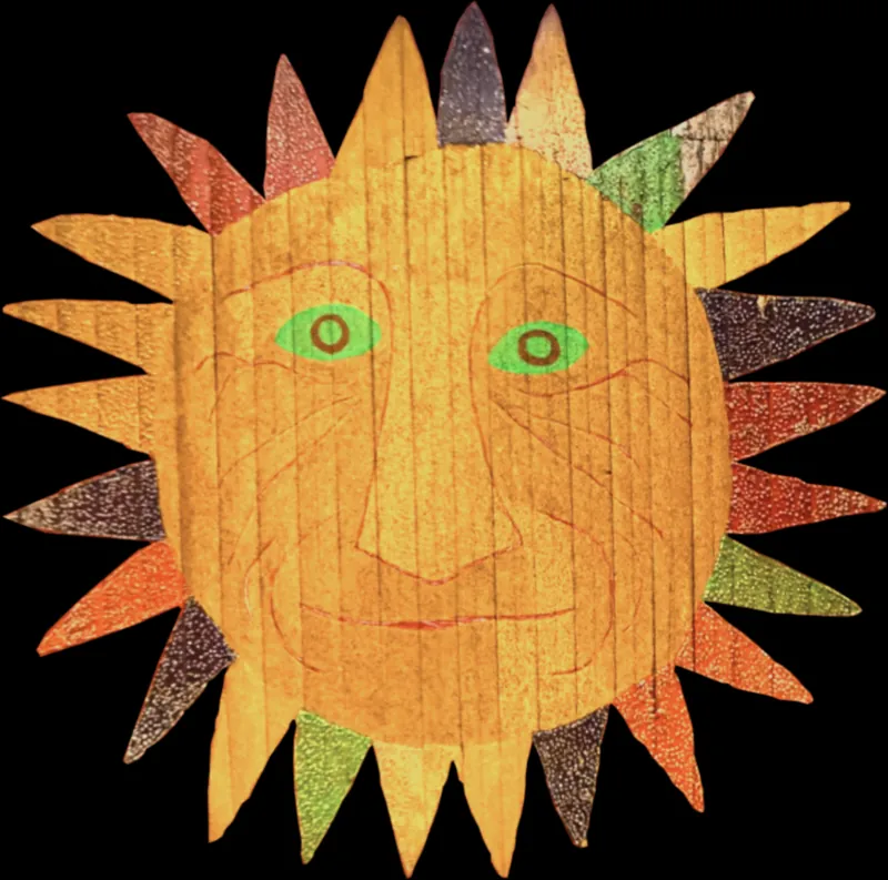 A painted sun with green eyes and multicoloured rays