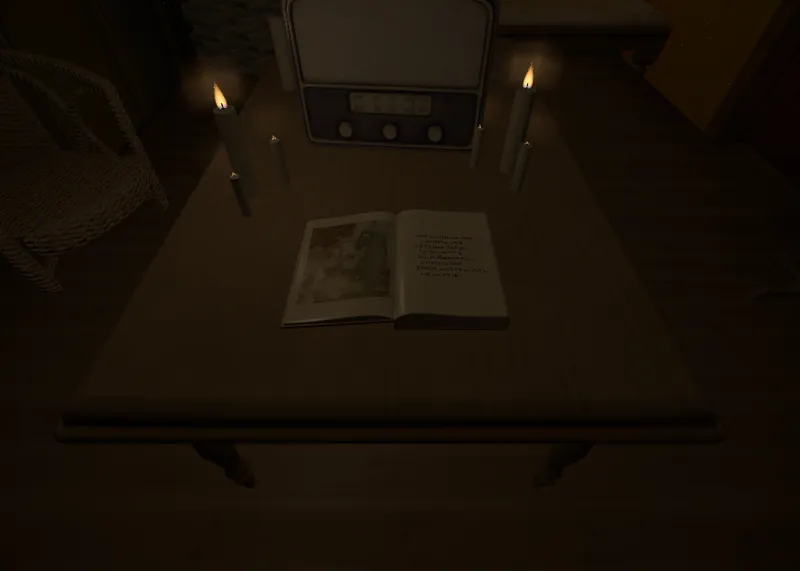 An open book on a table between two lit candles, with an old radio behind it